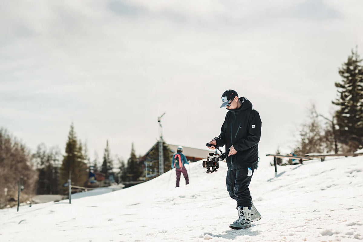 Noah is recording while in a snowy landscape