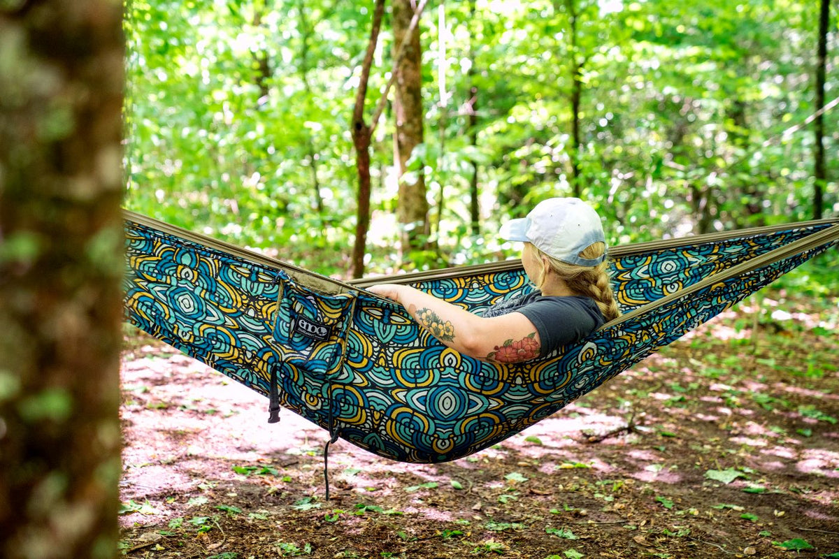 Woman in ENO Roots Studio x ENO Hammock in the woods