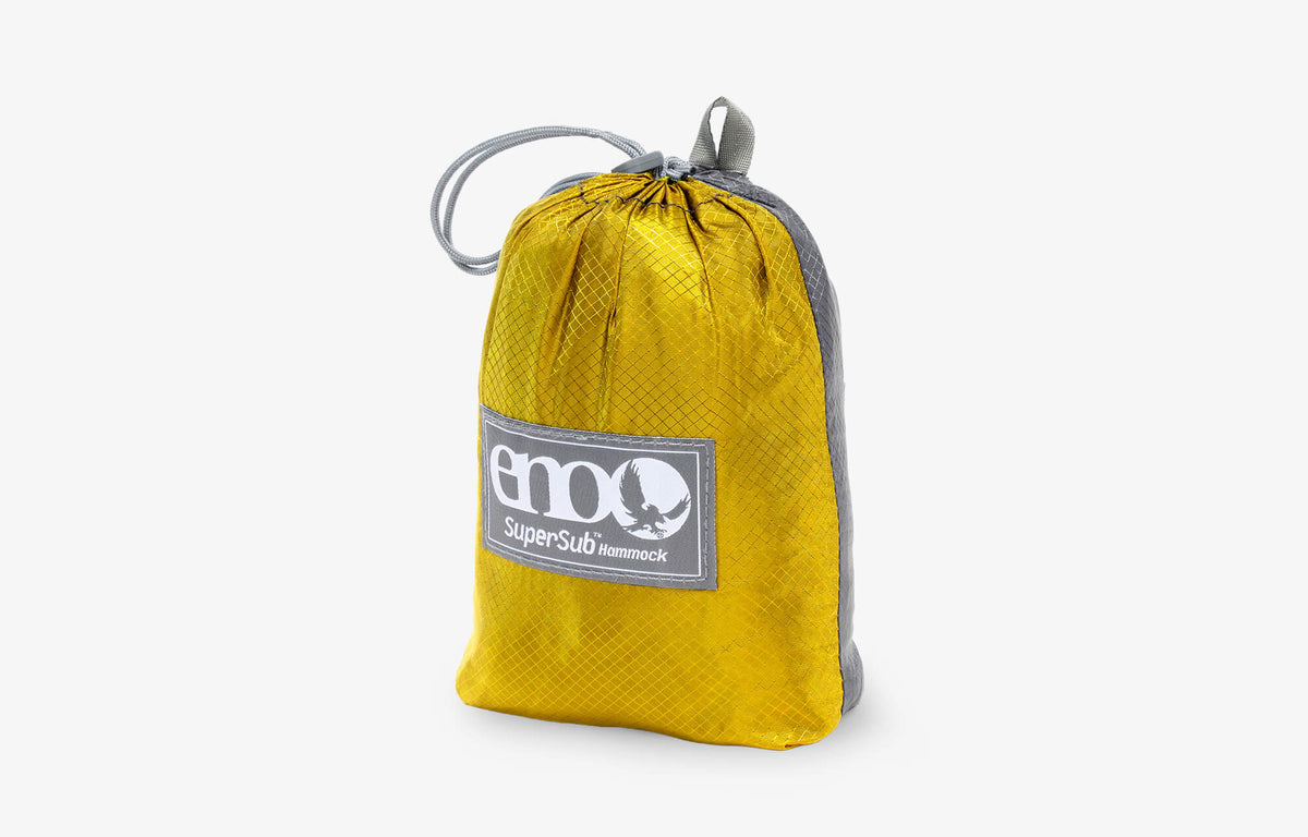 SuperSub Ultralight Hammock packed in stuff sack with ENO logo on a white background