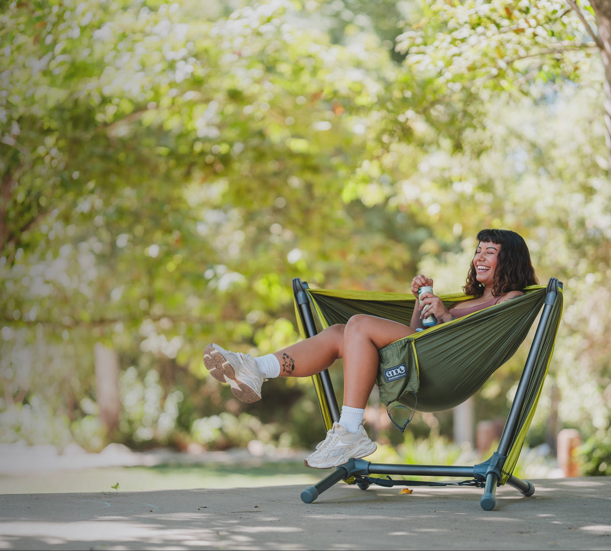 Load video: Looping animation of the ENO Parklite Hammock Chair Stand in Charcoal, Agave, and Sky colorways.